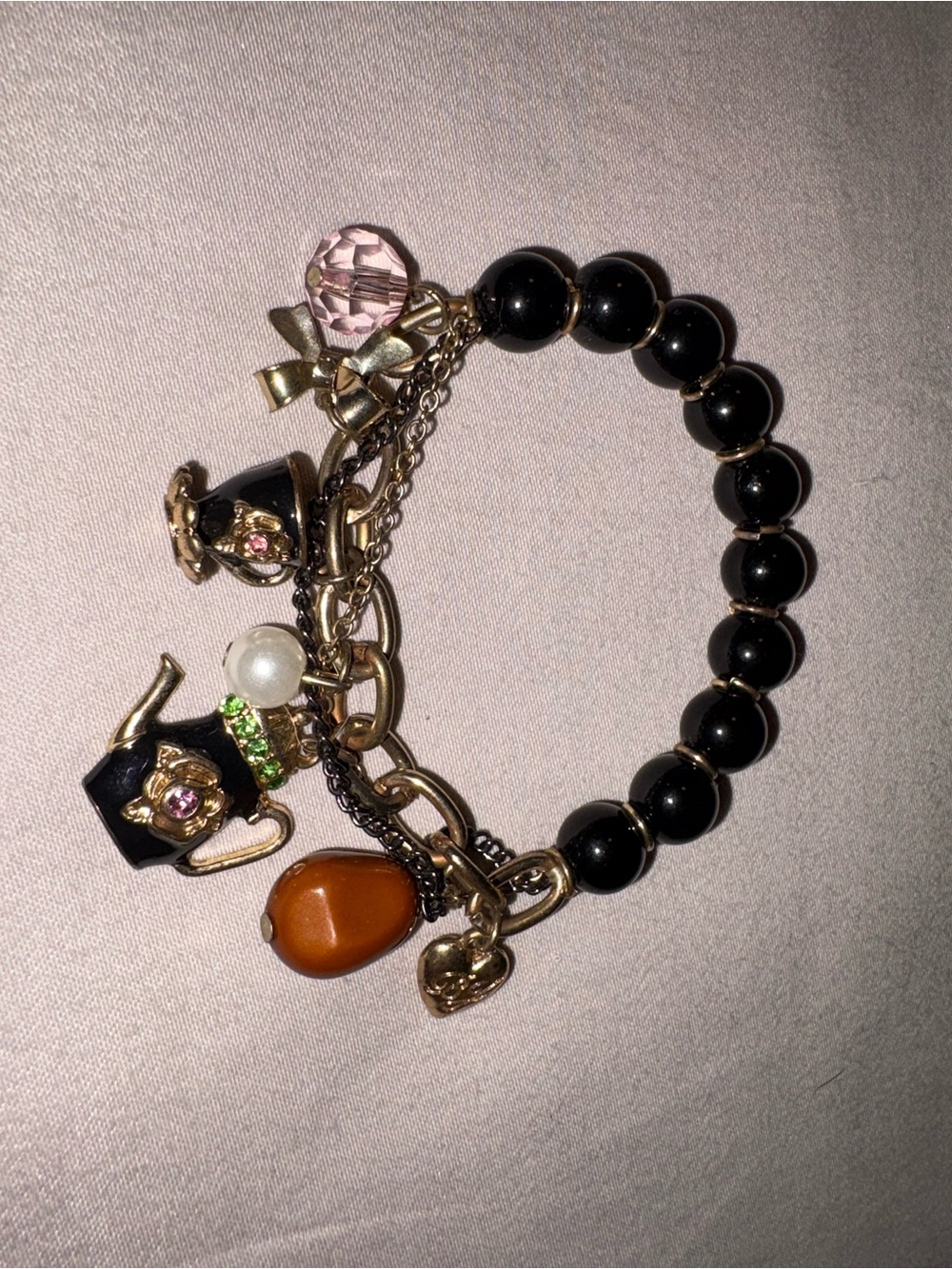 Betsey Johnson Black Bead Charm Bracelet with Gold Accents and Multicolor Charms